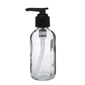 clear glass bottle with black plastic pump head