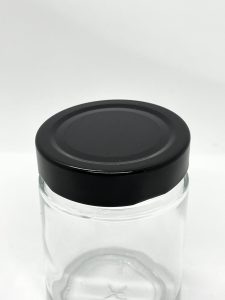 round glass jar with black lug cap