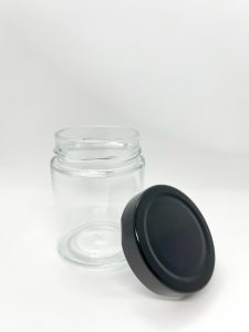 round glass jar with black lug cap