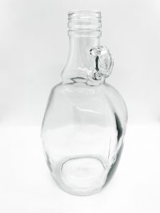 fat round glass bottle with mini handle