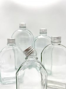 slanted shoulder clear liquor glass bottles