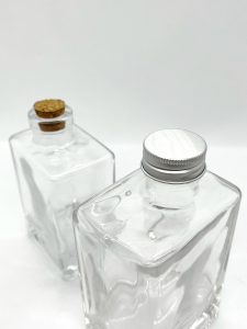 clear liquor glass bottle screw and cork cap